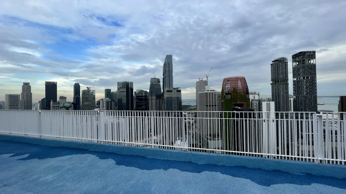 a city skyline with a bridge