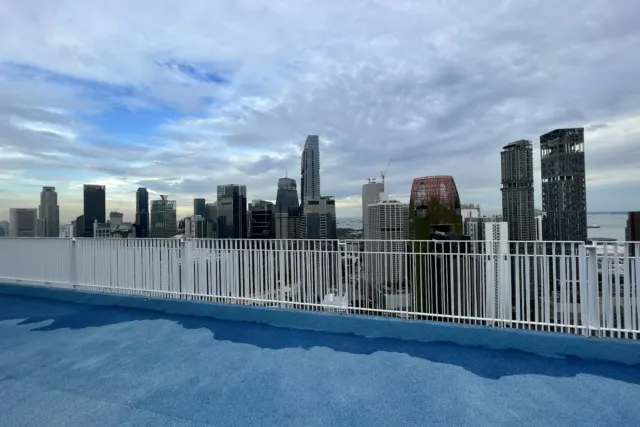 a city skyline with a bridge