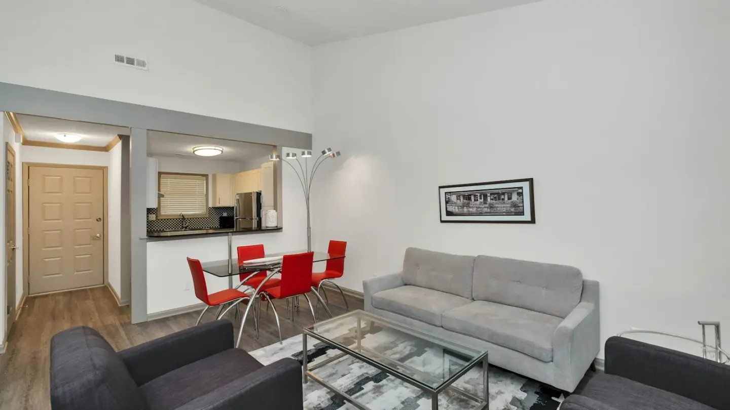 gray sofa near white wall